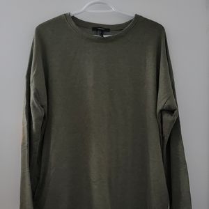 Green sweater with brown suede on elbows